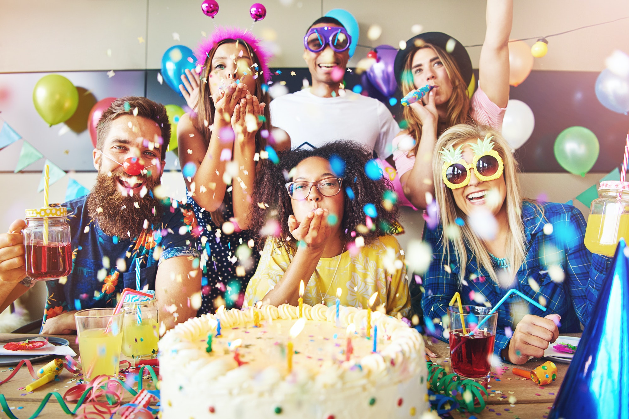 confetti-flying-around-group-celebrating-a-party.jpg